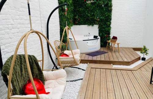 Tourcoing Apartment | Discover the Green Love Suite with Relaxing Spa Amenities