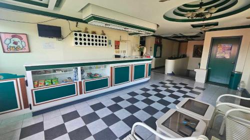 Dipolog Hotel | Discover Green Mellow Court: Pet and Child Friendly Stay