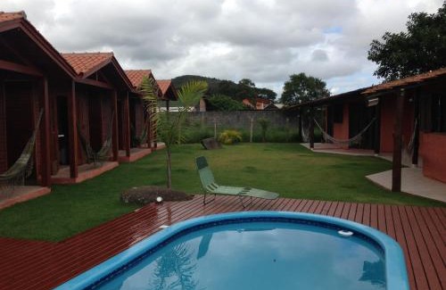 Rio Vermelho Sul Hotel | Inviting Green Mountain Pousada with Pool & Ocean Views