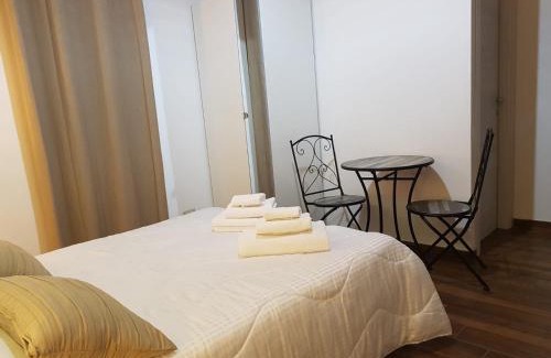 Castelforte Apartment | Exquisite Green Oasis Gabella Monolocale with Oceanfront Views
