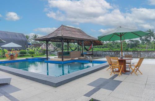 Tetebatu Hotel | Inviting Green Orry Inn: Oceanfront Pool & Family-Friendly