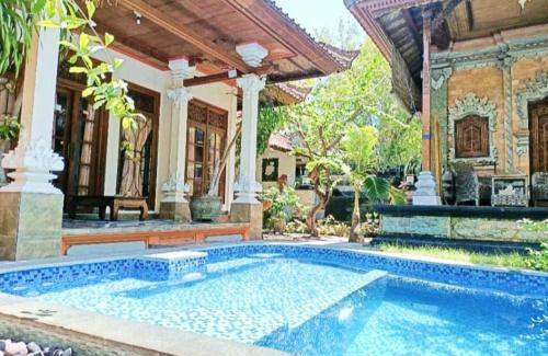 Sampalan House | Cozy Green Palace Homestay: Pet-Friendly & Family-Loved