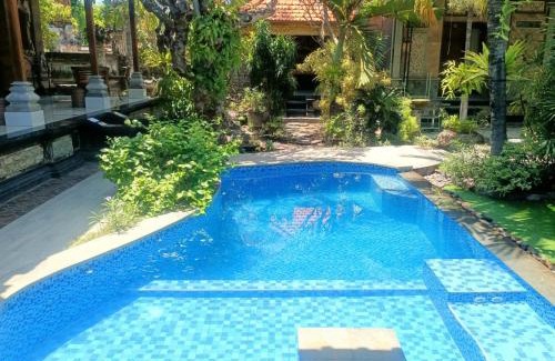 Sampalan House | Cozy Green Palace Homestay: Pet-Friendly & Family-Loved