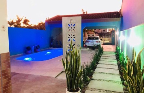 Guaratuba House | Relax at GreenHouse: Steps from the Beach & Family-Friendly