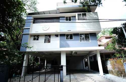 Kozhikode Apartment | Greens Apartments: Your Ideal Family Retreat with Kitchen