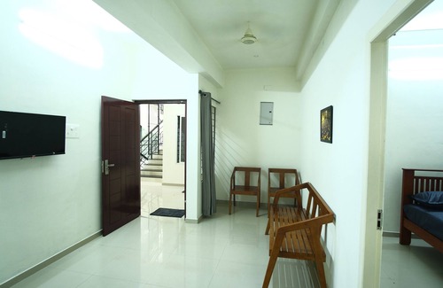Kozhikode Apartment | Greens Apartments: Your Ideal Family Retreat with Kitchen