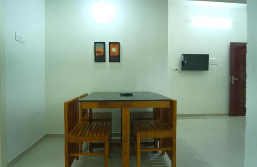 Kozhikode Apartment | Family-Friendly Greens: Highly Rated with Great Amenities