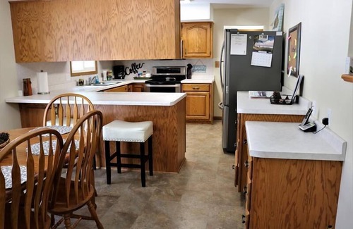 Escanaba House | Greenwood Getaway: Fun Game Room & Pet-Friendly Retreat