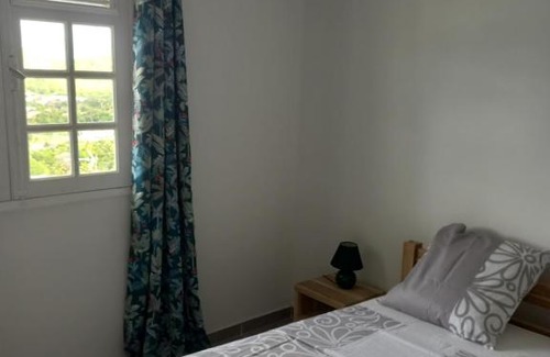 Trois-Ilets Apartment | Oceanfront Grenadine: A 4-Star Family Retreat with Views