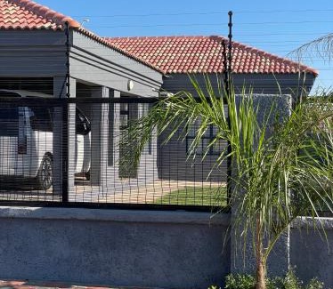 Palapye House | Pet-Friendly Haven: Grey Net with Family & Kitchen Amenities
