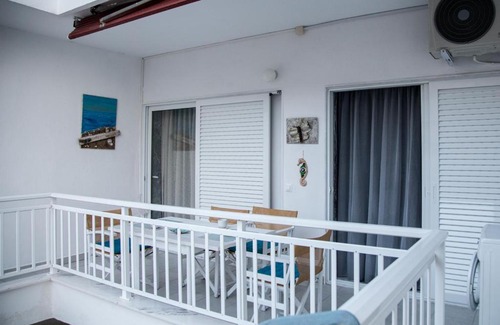 Paralia Dionysiou Apartment | Oceanfront Grey Theros Apartments: Guest Rated 9.6/10