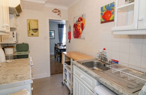 Port William House | Charming Greystones Cottage with Ocean Views in Port William