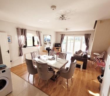 Shiplake House | Inviting Greystones Clock Tower Lodge with Hot Tub Access