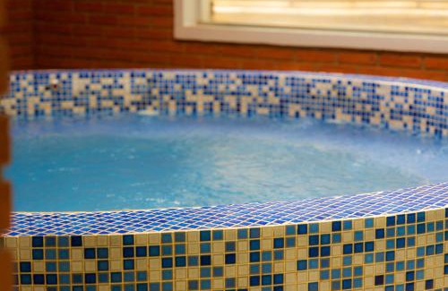 Socorro Hotel | Explore Grinbergs Village Hotel: Poolside Oceanfront Retreat