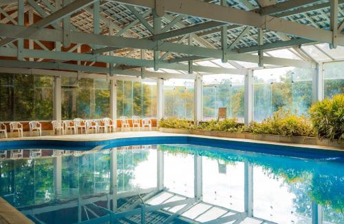 Socorro Hotel | Explore Grinbergs Village Hotel: Poolside Oceanfront Retreat