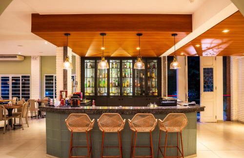 Socorro Hotel | Explore Grinbergs Village Hotel: Poolside Oceanfront Retreat