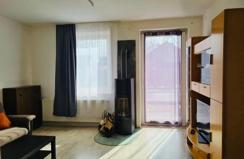 Kaufbeuren Apartment | Inviting 3-Room Apartment with Garden and Fireplace for Groups