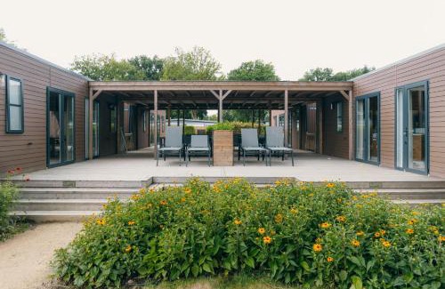 Voorthuizen House | Groepsvakantie op de Veluwe – 4 losse lodges voor 24 personen op Vakantiepark De Boshoek