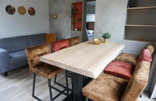 Voorthuizen House | Groepsvakantie op de Veluwe – 4 losse lodges voor 24 personen op Vakantiepark De Boshoek