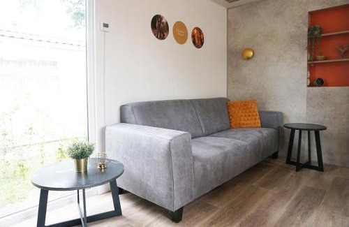 Voorthuizen House | Groepsvakantie op de Veluwe – 4 losse lodges voor 24 personen op Vakantiepark De Boshoek