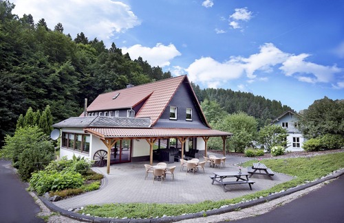 Schutzbach House | Ideal Family Retreat with Sauna, Hot Tub, and Private Theater