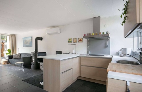 Grou House | Inviting Holiday Home with Expansive Terrace in Grou