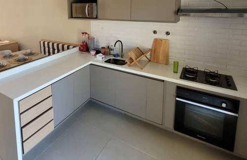 Itacimirim Apartment | Ground Floor Apartment 3/4 (2 Suites) Cond. Feet in the Sand – Quinta das Lagoas Beach