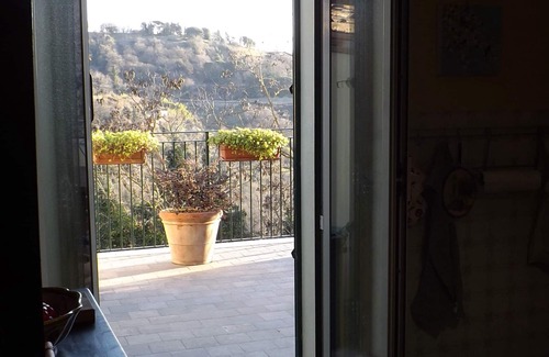 Scansano Apartment | Cozy Ground Floor Apartment with Terrace in Town Centre