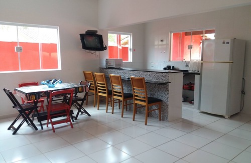Caraguatatuba House | Ideal Getaway: Poolside Comfort Steps from the Beach