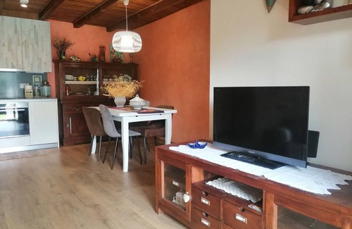 Taull Apartment | Ground Floor Puig Falcó 2: Garden Retreat with BBQ Access