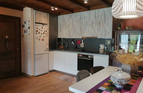 Taull Apartment | Ground Floor Puig Falcó 2: Garden Retreat with BBQ Access