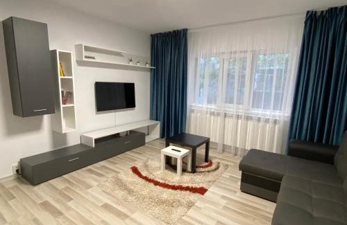 Buzau Apartment | Guest Rated 10/10: Grove Apartment with Hot Tub & Kids' Amenities