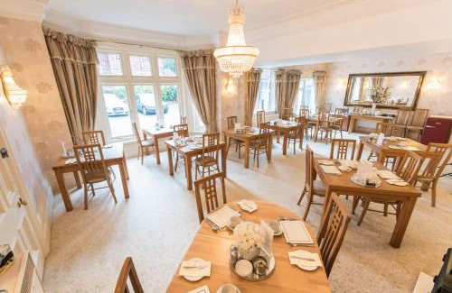 Canford Cliffs Hotel | Grovefield Manor: Oceanfront Retreat with 4-Star Comfort