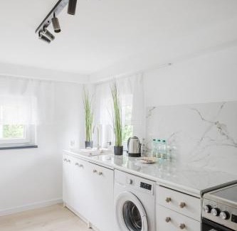 Grunwald Apartment | Grunwald Raszyńska Bright Apartment by BookingHost
