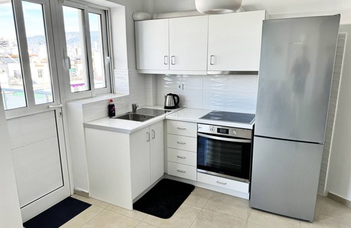 Nea Smirni Apartment | Gtrip Nea Smyrni Floor Apartment with Family-Friendly Amenities