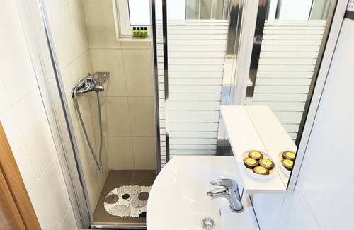Nea Smirni Apartment | Gtrip Nea Smyrni Floor Apartment with Family-Friendly Amenities