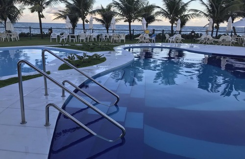 Abrantes Apartment | Discover Guarajuba Beach: Ocean View, Pool & Spa Retreat