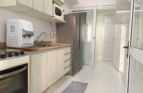 Asturias Apartment | Discover Guarujá Asturias: Relax with Ocean Views & Spa