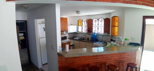 Balneario Praia do Pernambuco Villa | Oceanfront Retreat: Guarujá Mar with Pet-Friendly Perks