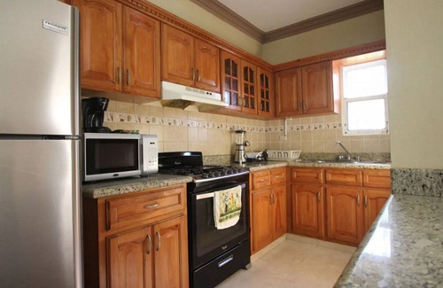 La Esplanada Villa | Discover a 14BD Oasis in Central Sosua with Pools & Views