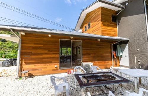 Amami House | Relax at Guest House Amami Long Beach - Family-Friendly Retreat