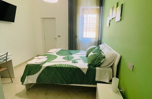 Zungoli Bed & Breakfast | Guest House " La Corte" Green Orchid. An oasis of serenity and refinement.