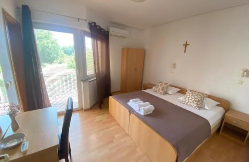 Medjugorje House | Budget-Friendly Stay at Guest House Regina Mundi - 9/10 Rating