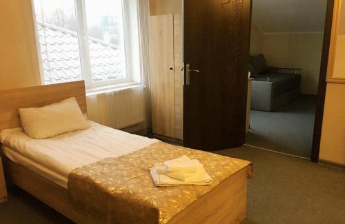 Svyatoshyns'kyi District Hotel | Cozy Guest House SOTNI with Breakfast & Top Ratings