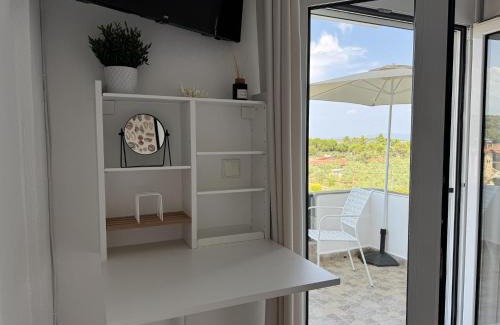Vourvourou Apartment | Guest Room by House Dimitra
