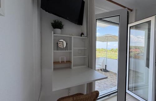 Vourvourou Apartment | Guest Room by House Dimitra