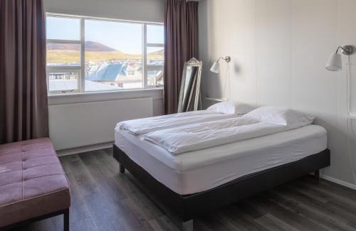 Vestmannaeyjar House | Inviting Guesthouse Hamar: Family-Friendly with Hot Tub