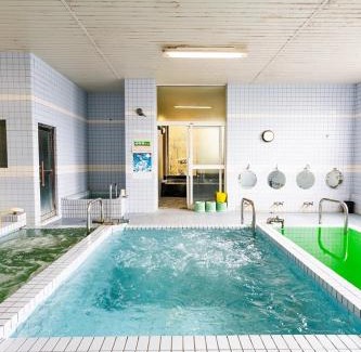 Urakawa House | Cozy Guesthouse Masago: Family-Friendly with Kitchen Access