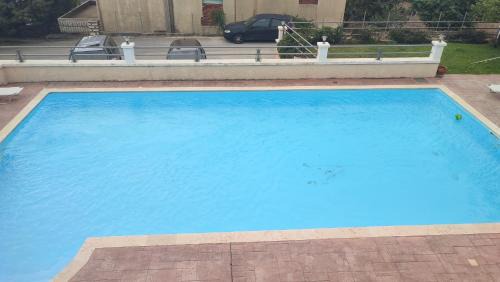 Kamarina Apartment | Oceanfront Guesthouse Michobeis with Pool & Kid-Friendly Fun