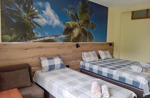 Kiten House | Pet-Friendly Guesthouse Oasis with Hot Tub & Breakfast